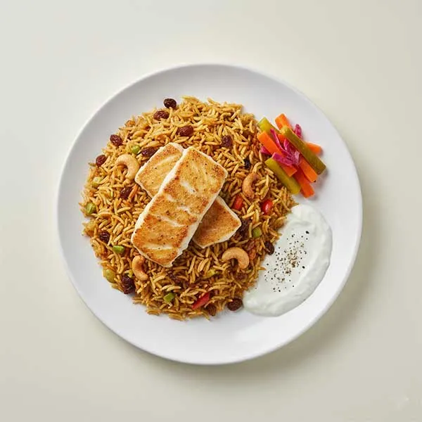 Machboos Samak with Pickled Vegetables and garlic yogurt sauce